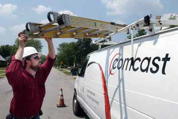 A Comcast communications technician from file photo.