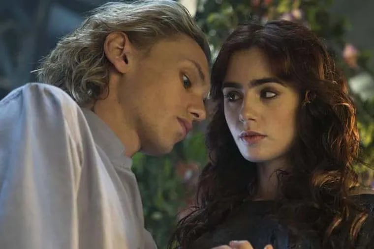 Jamie Campbell Bower and Lily Collins star in "The Mortal Instruments: City of Bones." (Rafy/Screen Gems/MCT)