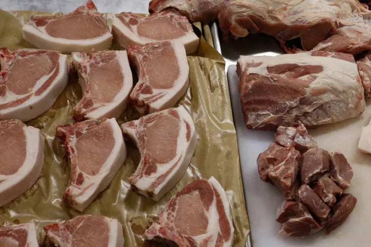 Pork chops cut by Heather Marold Thomason, owner and butcher at Primal Supply Meats in a photograph from October 9, 2017.