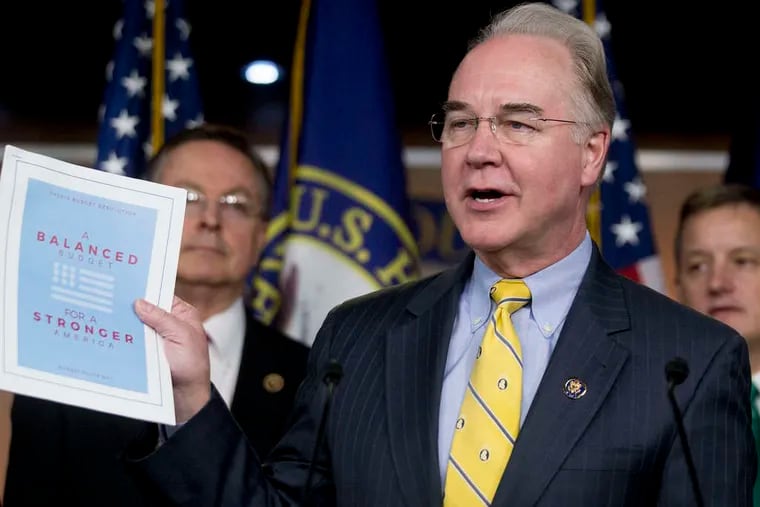 Rep. Tom Price (R., Ga.), chairman of the House Budget Committee, holds up a copy of the 10-year Republican blueprint titled &quot;A Balanced Budget for a Stronger America.&quot;