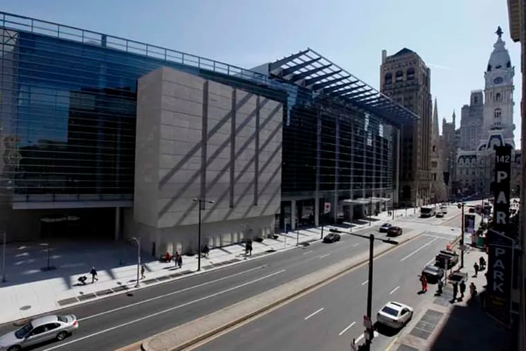 The newly expanded Pennsylvania Convention Center is seen in view of City Hall in Philadelphia, Friday, March 4, 2011. (AP Photo/Matt Rourke)