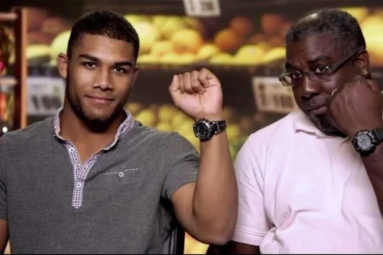 Chef Keith Taylor (right) with his son Zachary, now 24, namesake of Zachary's BBQ, in a screen grab from a 2017 episode of "Guy's Grocery Games," a Food Network show.