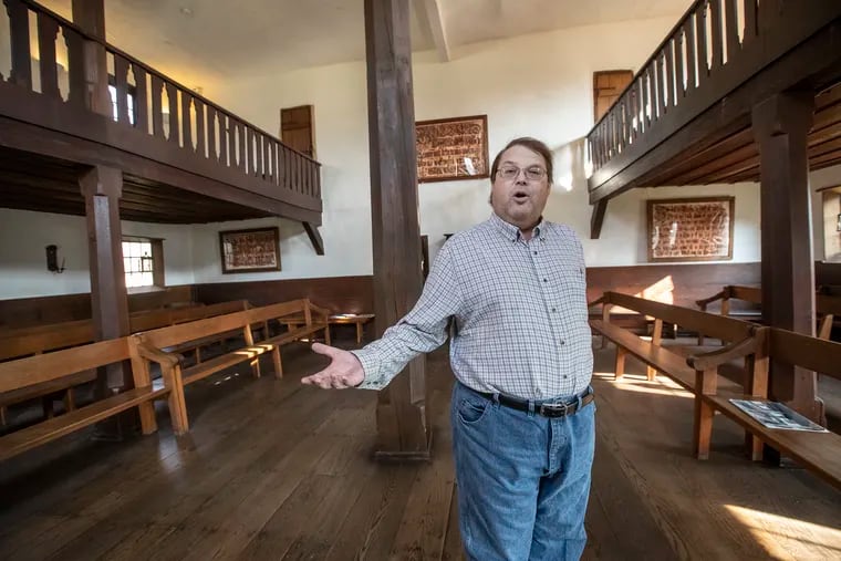 Michael Showalter, the museum educator, stands in the interior of the Saal, the meeting house for the female Celibates that lived on the property of the Ephrata Cloisters, and talks about the history of the building, on November 19, 2019.
