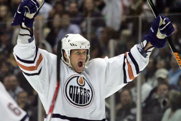 Edmonton Oilers' Chris Pronger celebrates his goal against the Anaheim Mighty Ducks during in 2006. (AP Photo/Chris Carlson)