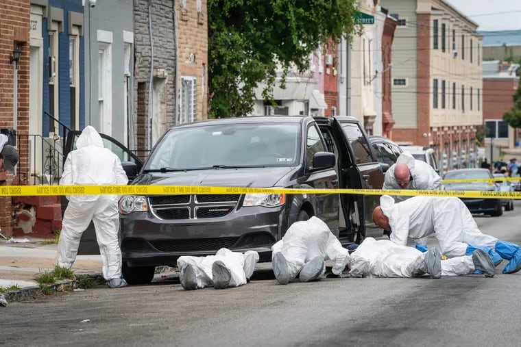 The scene on the 1700 block of West Venango Street in Philadelphia where an FBI agent shot a person while serving a search warrant on Friday.