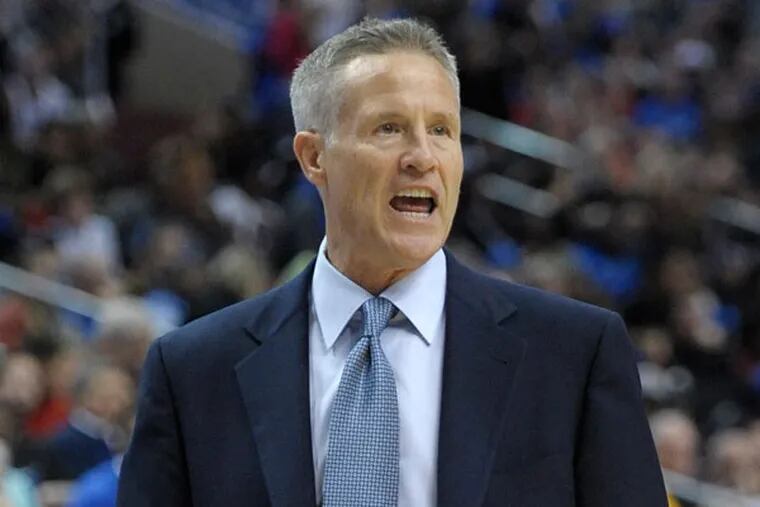 76ers head coach Brett Brown is seen during the second half of an NBA basketball game against the Miami Heat on Wednesday, Oct. 30, 2013, in Philadelphia. (Michael Perez/AP)