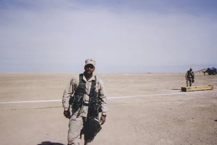 Manan Trivedi in March 2003, the battalion surgeon for the 1st Battalion, 5th Marines, days prior to when he entered Iraq at the start of the war. Twenty years later, "I'm still angry about it," he writes.