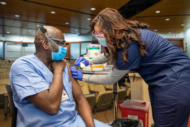 Eric Young, a registered nurse, was the first to receive the COVID19 vaccine at Penn Medicine on Dec. 16, 2020.