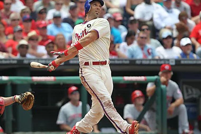 Raul Ibanez hits a three-run home run in the third inning. (David M Warren/Staff Photographer)