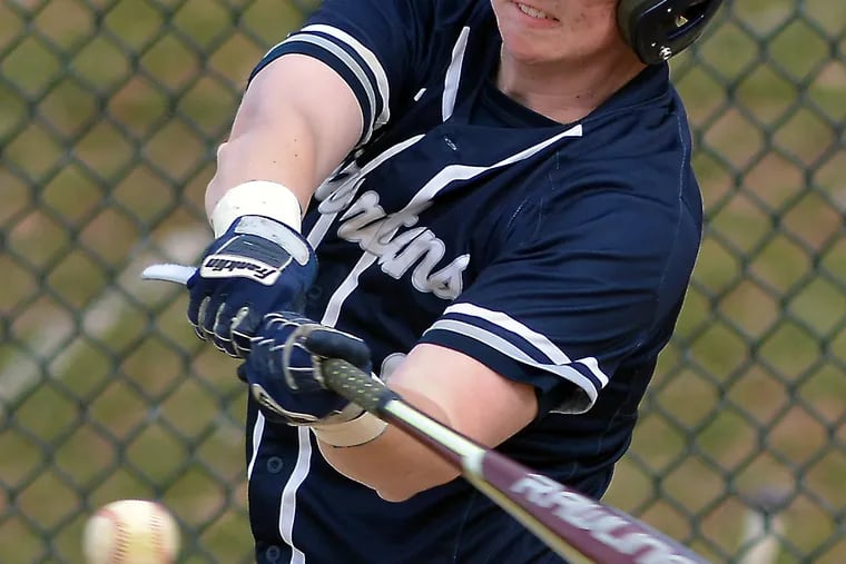Springfield Montco's Brian Murphy connects on a pitch during its game at Abington on Thursday, March 28,2019.