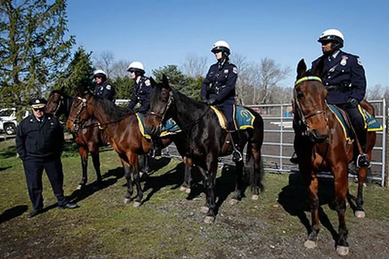 Police commissioner Charles H. Ramsey (left) waits for the start of a press conference at White Pine Farms in Richboro, to annouce the formation of a new mounted unit. Five horses were aquired from a disbanded unit in Newark, N.J. (Michael S. Wirtz / Staff Photographer)