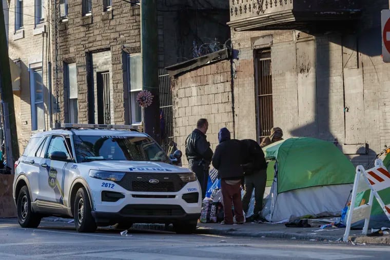 Philadelphia police along Kensington and E. Orleans Street moving people off the sidewalk on Wednesday morning. Philadelphia Mayor Cherelle Parker mentioned cleaning up the city and quality of life as major parts of her first term.