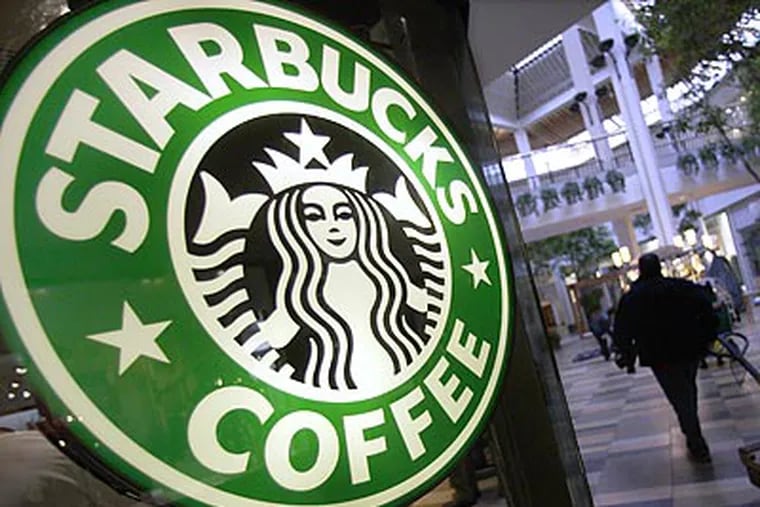The inflation-adjusted price of housing in the United States topped out at almost the same point in 2006 that Starbucks stock reached its highest value. (Amy Sancetta/AP file photo)