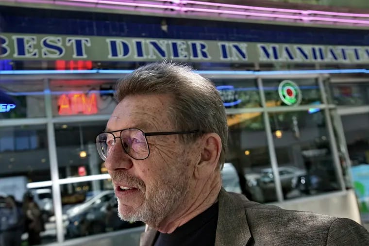 This June 2007 photo shows Pete Hamill during an interview at the Skylight Diner in New York.