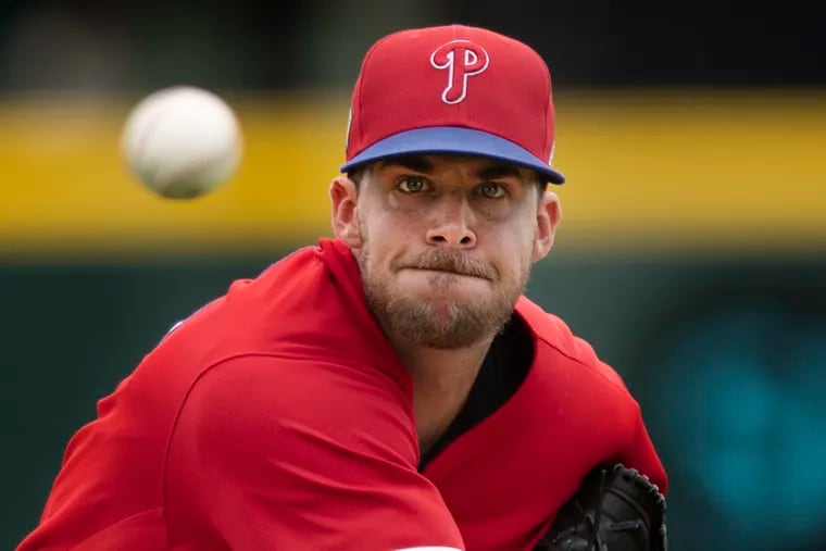 Phillies starting pitcher Aaron Nola throws against the Pittsburgh Pirates on March 24.