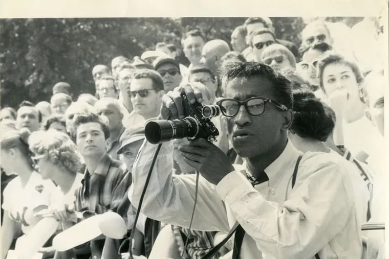 Sammy Davis Jr. with a camera in a scene from the "American Masters" documentary "Sammy Davis, Jr.: I've Got to Be Me," premiering on PBS on Tuesday, Feb. 19.