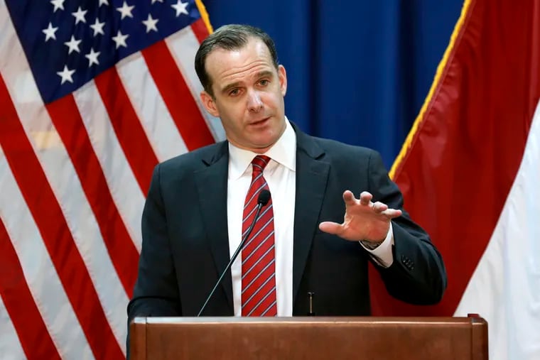 FILE - In this June 7, 2017, file photo, Brett McGurk, then U.S. envoy for the global coalition against IS, speaks during a press conference at the U.S. Embassy Baghdad, Iraq.  President Donald Trump is recycling familiar fictions concerning the Iran nuclear deal as he lashes out at a Republican senator who criticized him and a U.S. official who resigned in protest against Trump’s plan to pull troops from Syria. Trump slapped both critics in one tweet Monday: “For all of the sympathizers out there of Brett McGurk remember, he was the Obama appointee who was responsible for loading up airplanes with 1.8 Billion Dollars in CASH & sending it to Iran as part of the horrific Iran Nuclear Deal (now terminated) approved by Little Bob Corker.”  (AP Photo/Hadi Mizban, File)