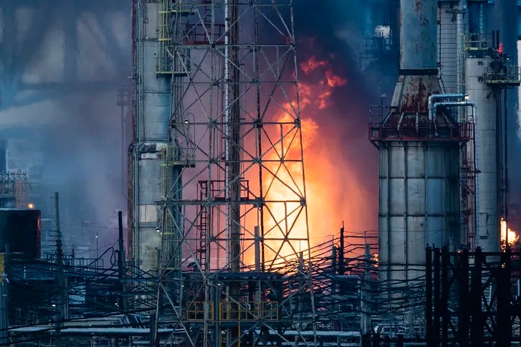 Flames and smoke emerge from the Philadelphia Energy Solutions Refining Complex on June 21, 2019.