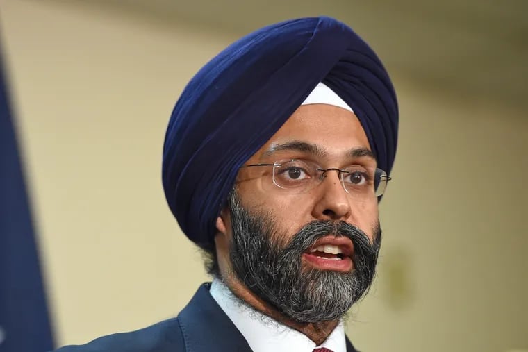 New Jersey Attorney General Gurbir Grewal at press conference February 14, 2018, announcing arrests in a major interstate gun trafficking ring that brought weapons, including AK-47s into Camden. TOM GRALISH / Staff Photographer 