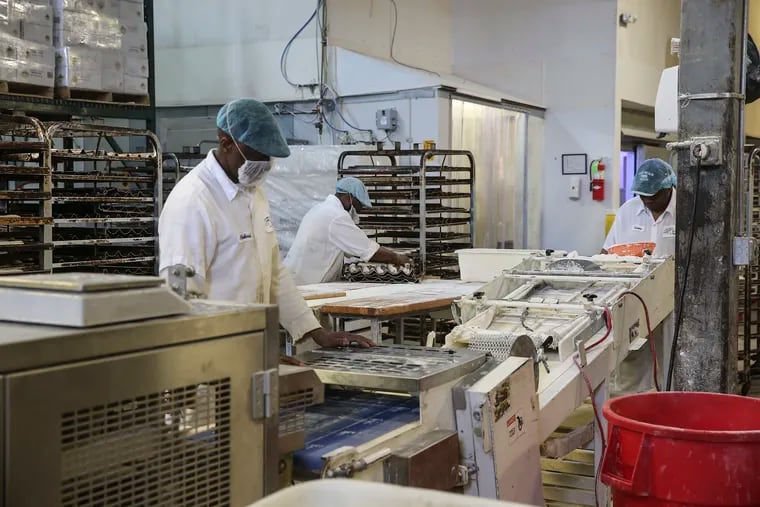 Le Bus Bakery employees making baguettes in King of Prussia, Pa., on on Tuesday March 10, 2020, days before Pennsylvania's and other governors ordered the closure of food establishments for sit-down dining due to the coronavirus.