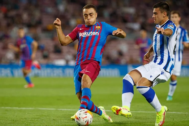 U.S. national team star Sergiño Dest (left) hasn't much played for Barcelona this season, and could leave the club this winter.