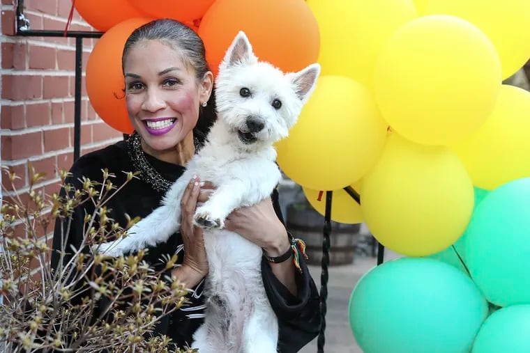Angelita Byrd with her dog, Sonny. She celebrated her 48th birthday with friends around the world using Zoom because of the coronavirus pandemic.
