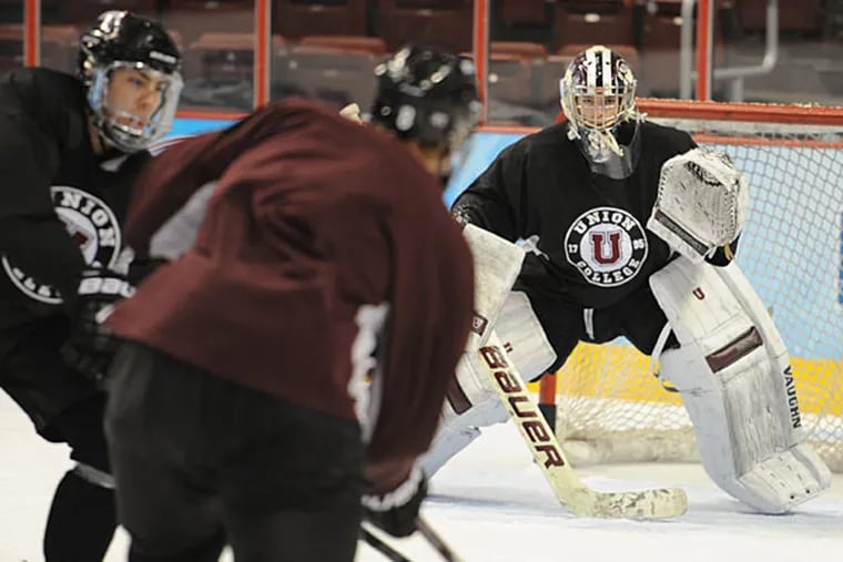 Union College goalie Colin Stevens follows the puck during practice at the Frozen Four at the Wells Fargo Center. (Clem Murray/Staff Photographer)