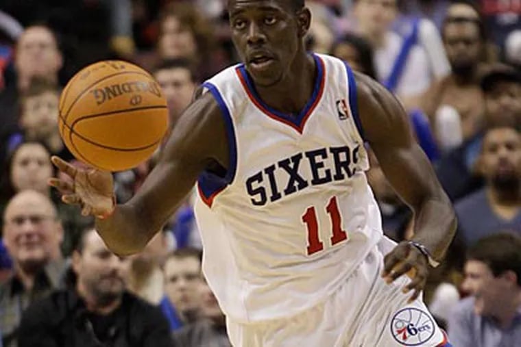 The lockout seems to have hurt Jrue Holiday and Evan Turner. (Matt Slocum/AP)