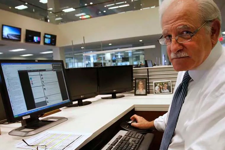 Photograph of 6 ABC anchor Jim Gardner at his desk where he tweets. Photograph from Friday afternoon April 5, 2013.