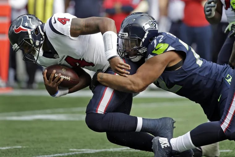 Michael Bennett, here sacking the Texans’ Deshaun Watson, will be joining the Eagles in a trade from Seattle.