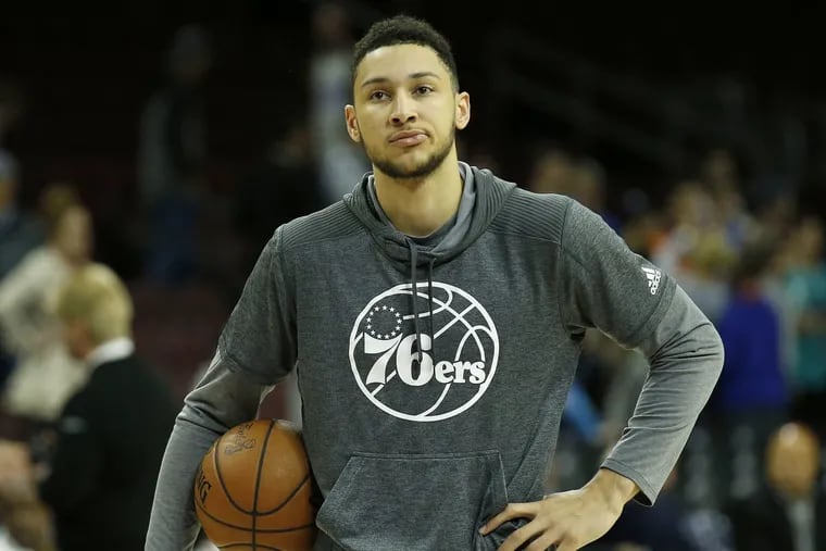The 76ers’ Ben Simmons holds a basketball during warm-ups before a game against the Chicago Bulls on April 6, 2017.
