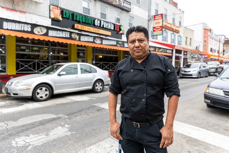 Nacho Flores, 47, of Veracruz, Mexico, owner of Los Taquitos de Puebla, poses for a portrait at his restaurant in South Philadelphia, Pa., on Thursday, Aug., 24, 2023. Flores opened his restaurant at the beginning of 2020 and has experienced multiple problems —  from people vandalizing his restaurant to his food truck being stolen twice.