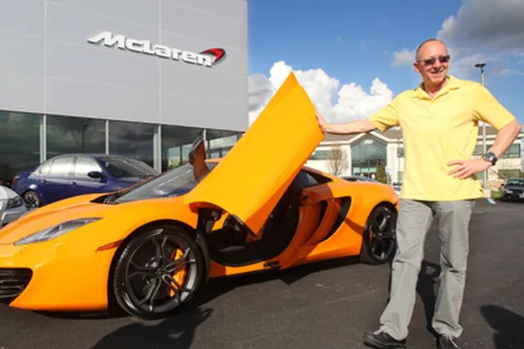 Real estate investor Mark Nichison of Philadelphia with the new McLaren MP4-12C he bought at McLaren Philadelphia on West Chester Pike in Willistown. (Charles Fox / Staff Photographer)