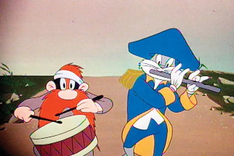 Cartoon characters Bugs Bunny, right, and Yosemite Sam are shown in a scene from "Looney Tunes, The Golden Collection." (AP Photo/Warner Home Video)