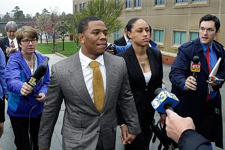 Baltimore Ravens football player and former Rutgers University standout, Ray Rice holds hands with his wife Janay Palmer as they arrive at Atlantic County Criminal Courthouse in Mays Landing, N.J., Thursday, May 1, 2014. MEL EVANS / Associated Press