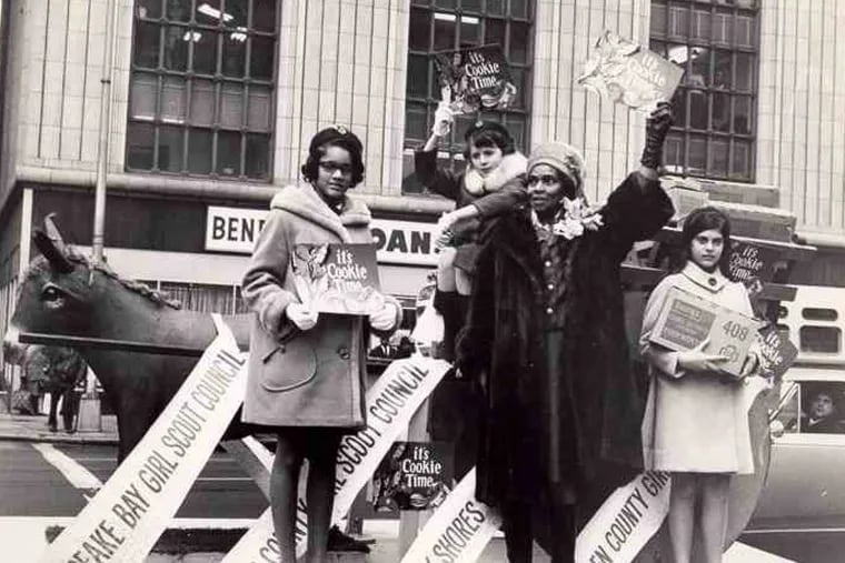 Marian Anderson selling Girl Scout cookies in front of Wanamakers department store in 1951.
