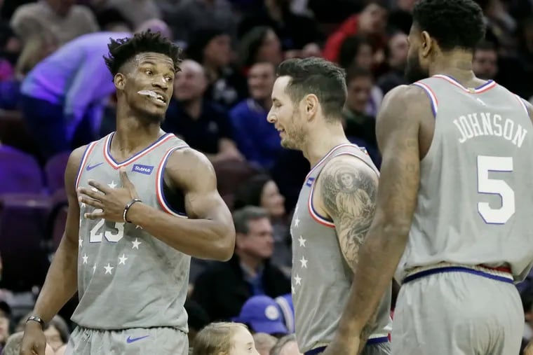Jimmy Butler points to himself during the Sixers' win against the Jazz on Friday.