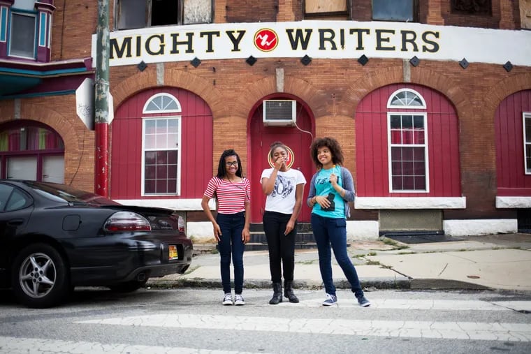 Mighty Writers participants pose outside one of the free workshop's locations.