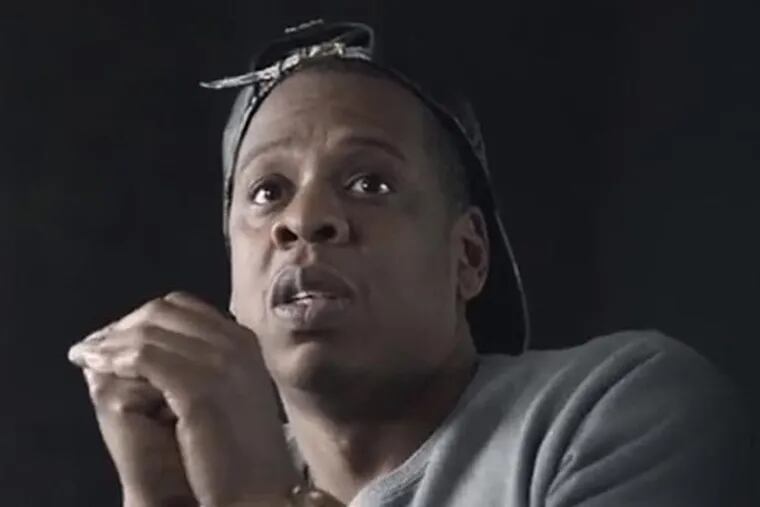 Jay-Z talks about navigating through success and failure and remaining
yourself during the begininng of a three-minute docu-mercial promoting
his new album "Magna Carta Holy Grail."