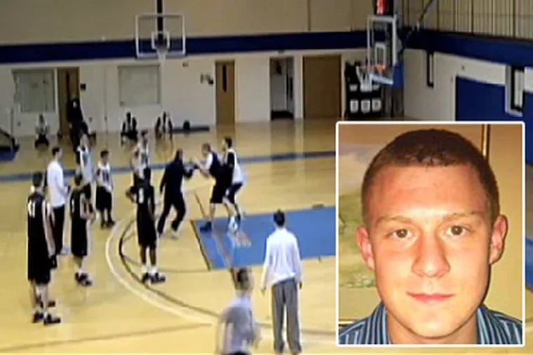 A frame taken from video provided to the Daily News which shows Holy Family basketball coach John O'Connor shoving sophomore Matt Kravchuk (inset).
