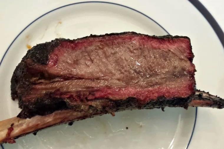 A rack of beef short ribs smoked over hickory and oak chunks for five or six hours has a vivid smoke ring. Slow-cooked and sprayed with a mix of Worcestershire sauce and beef broth, the ribs are likely flavorful enough to skip the table-served barbecue sauce.