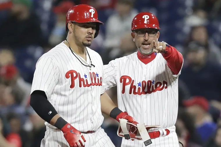 Jose David Flores (right) still has faith in the Phillies' use of defensive shifts. 