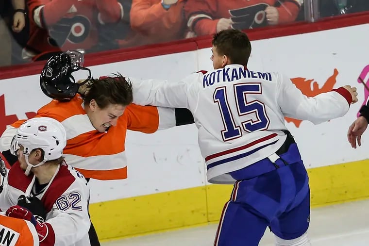 Montreal's Jesperi Kotkaniemi (right) got the better of a fight with Flyers defenseman Robert Hagg during the third period Thursday.