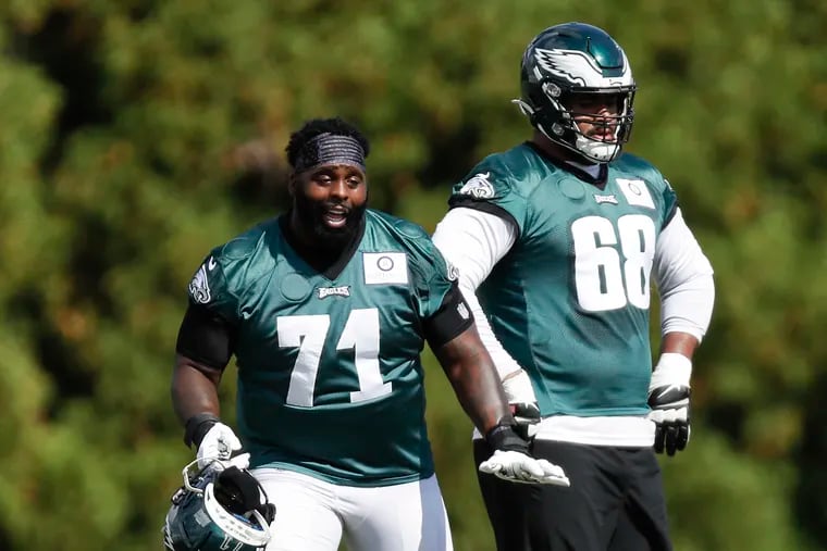 Jason Peters (left) played right guard Monday night, while Jordan Mailata (right) was at left tackle.
