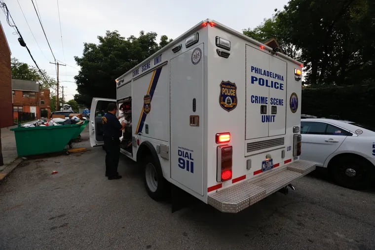 Police investigate a shooting with multiple victims in the Spring Garden section of Philadelphia on June 10.