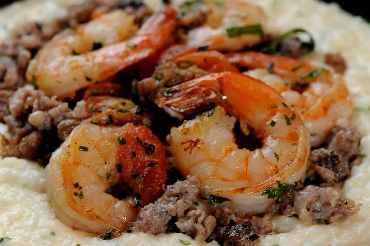 Shrimp and grits, a satisfying Southern meal priced right at $17. ( CLEM MURRAY / Staff Photographer )