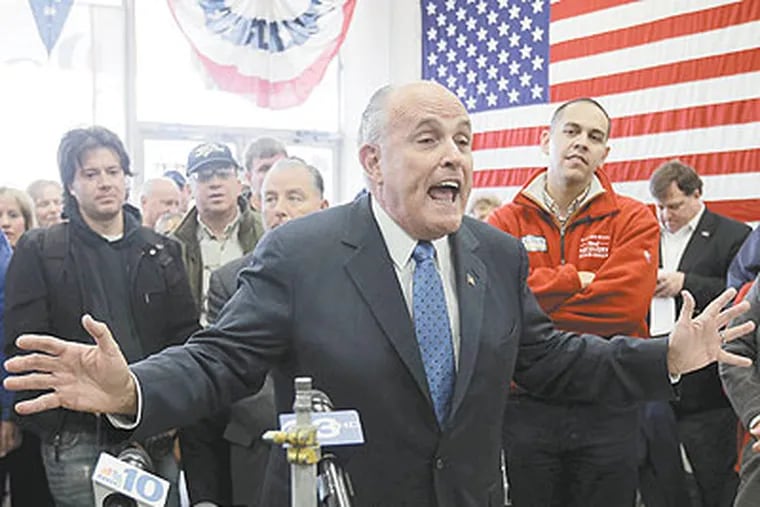 Former New York City Mayor Rudy Giuliani gestures as he speaks at an event in support of Republican presidential candidate. Mitt Romney, Monday, Nov. 5, 2012, in Conshohocken,Pa. (AP Photo / Matt Slocum)