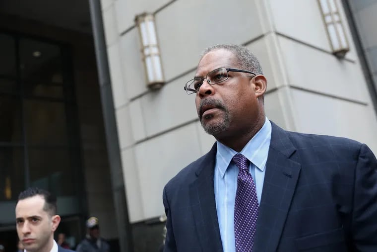 Former Philadelphia police Chief Inspector Carl Holmes was charged in 2019 with sexually assaulting three female police officers. Charges involving one of those victims have been withdrawn.