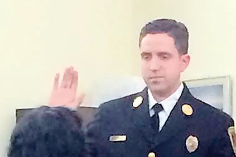 Jason Carty being sworn in to Westampton Township EMS director/fire chief.
