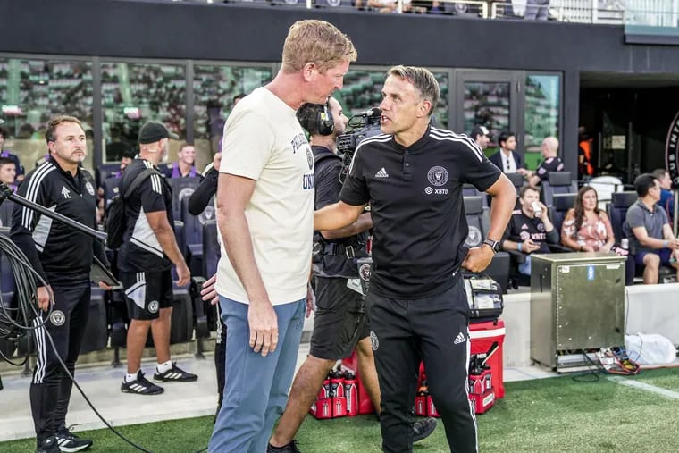 Union manager Jim Curtin (left) chatted with Inter Miami manager Phil Neville (right) before kickoff of Wednesday's game, and a few hours after the Union exercised the purchase option on Julián Carranza's loan from Inter.